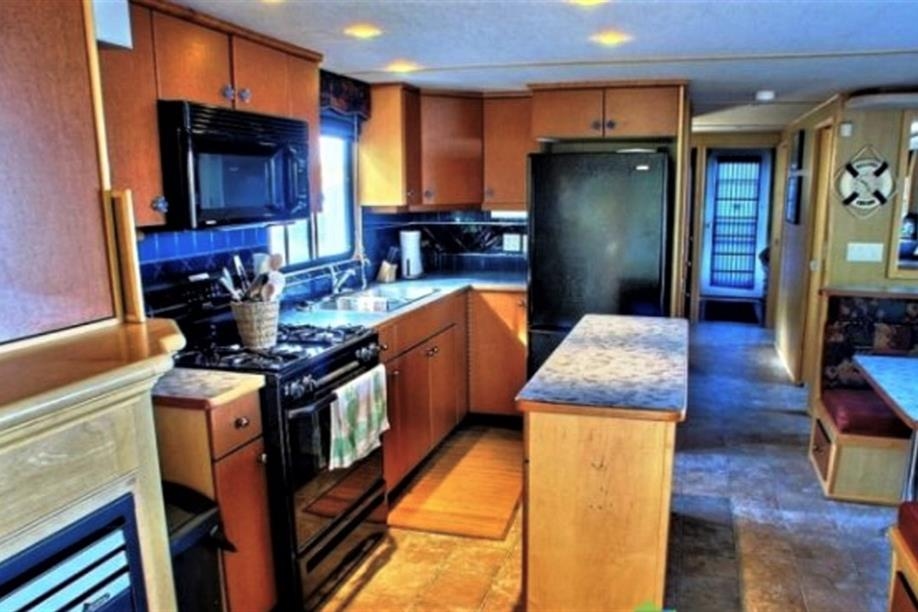 Aurora Houseboats - Kitchen area on 16-Sleeper Boat