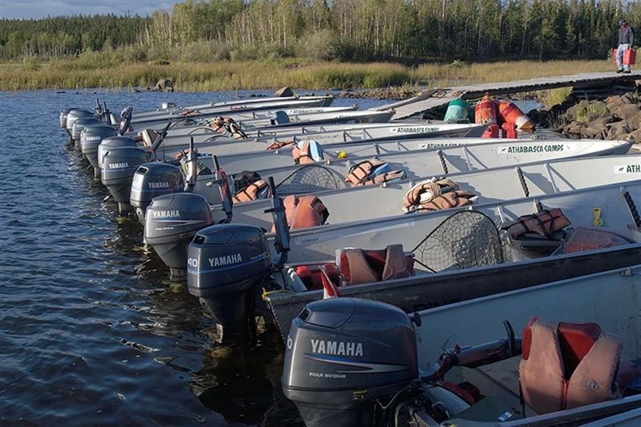 Motor boats at Otherside River Lodge. Photo Credit: Robin and Arlene Karpan
