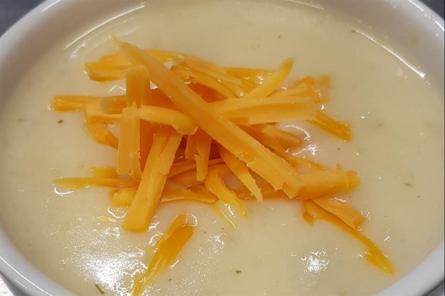 Cream of cauliflower soup topped with cheddar cheese