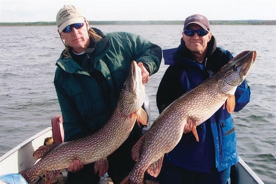 Athabasca Fishing Lodges - Double northern pike on Lake Athabasca.
