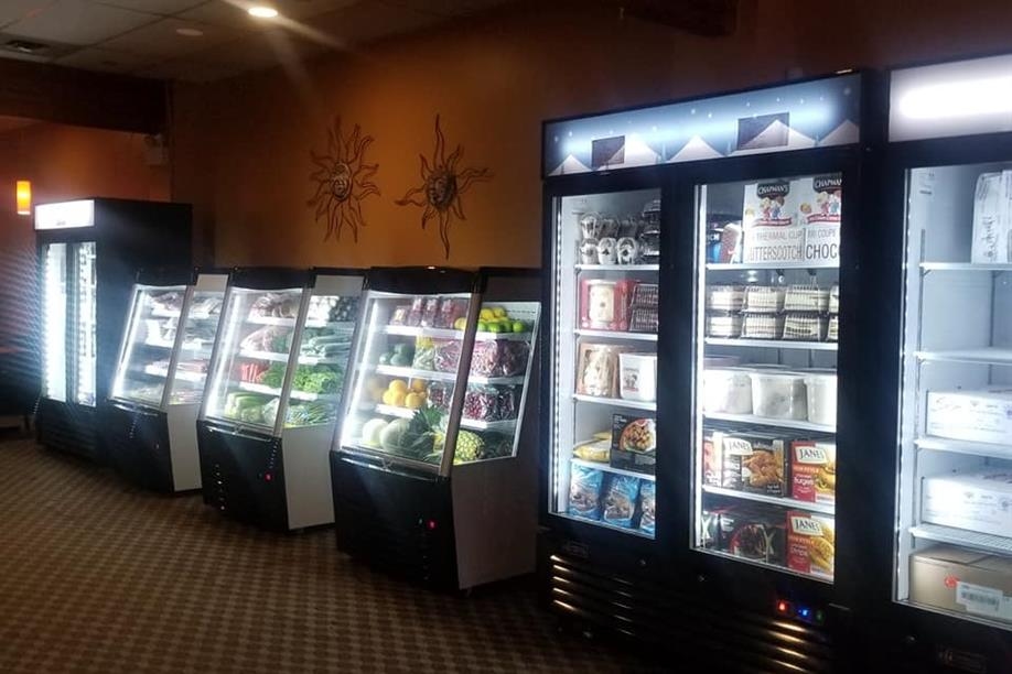Coolers and freezers filled with amazing food items