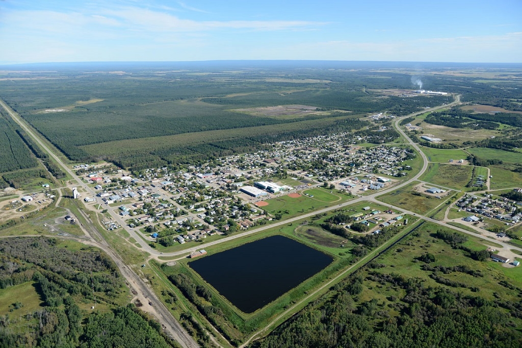 Aerial view - Hudson Bay is nestled in the boreal forest and Red Deer Valley with the Porcupine Hills to the southeast and the Pasquia Hills to the north